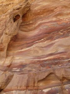 Walking past coloured rocks on the way up