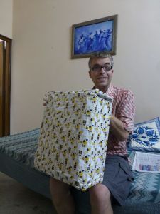 Reuben unwrapping our gift wrapped computer