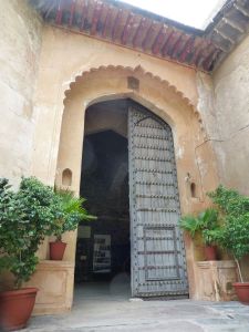 The impressive front door complete with spikes for elephants